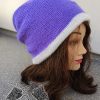 slouchy double layer knit hat on the mannequin head