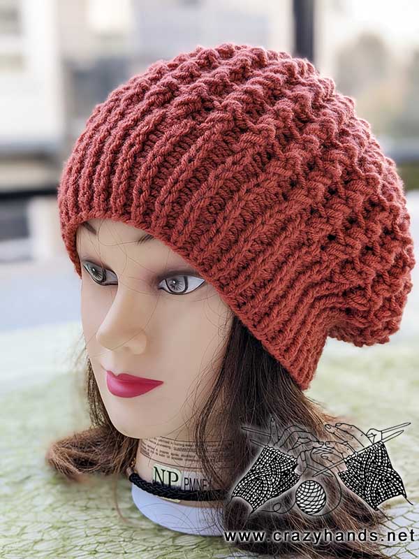 slouchy flat knit beret on mannequin - side view