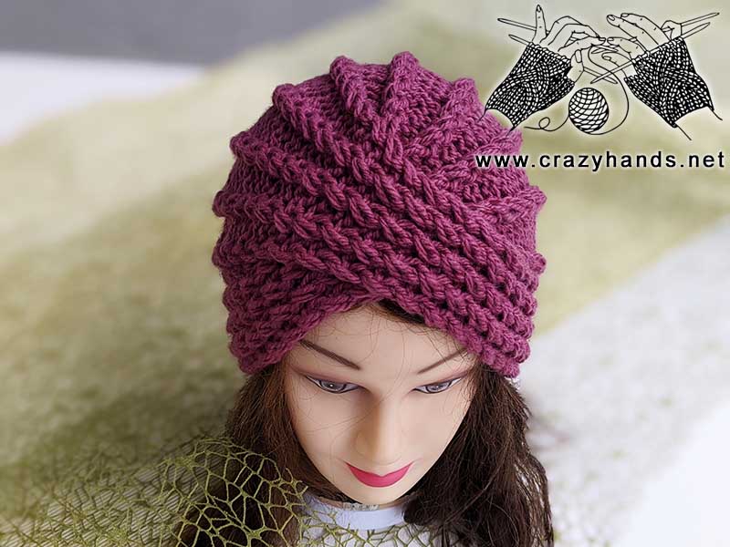 twisted knit turban hat on mannequin - front view