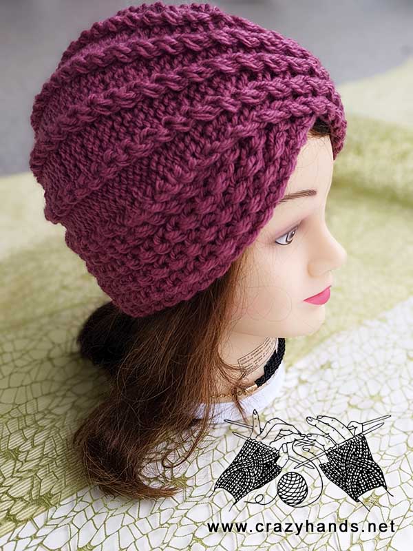 twisted turban knit hat on mannequin - side view