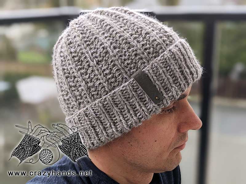 unisex winter knit hat on the male model - right side view