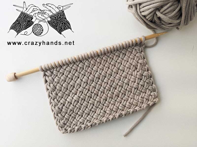 knit dishcloth made using diagonal basketweave stitch