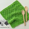 rebar knit kitchen towel with two wooden spoons
