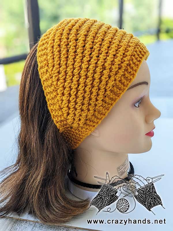 wide headband knitting pattern on the mannequin