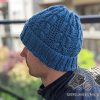 knit willow hat on a male model - left side view