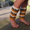 baby knit leg warmers on a baby model - side view