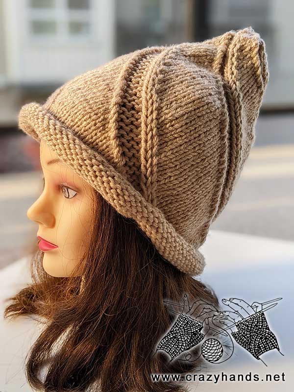 swirl witch knit hat on the female mannequin head
