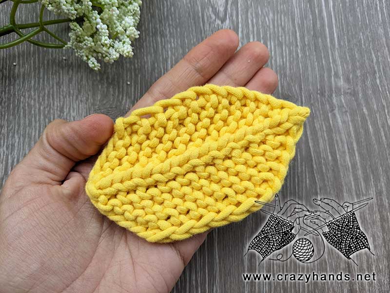 knit hexagonal leaf made with yellow yarn