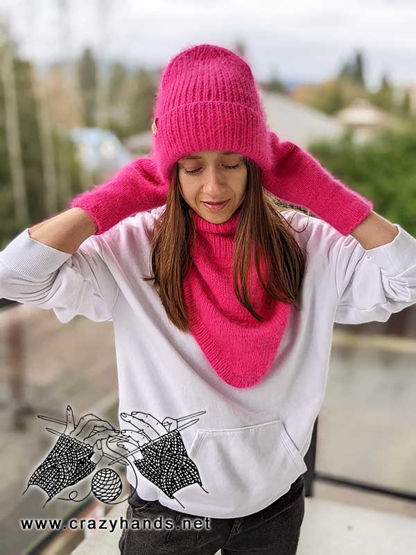knit barbie-style winter set on a female model - hat, mittens, and bandana cowl