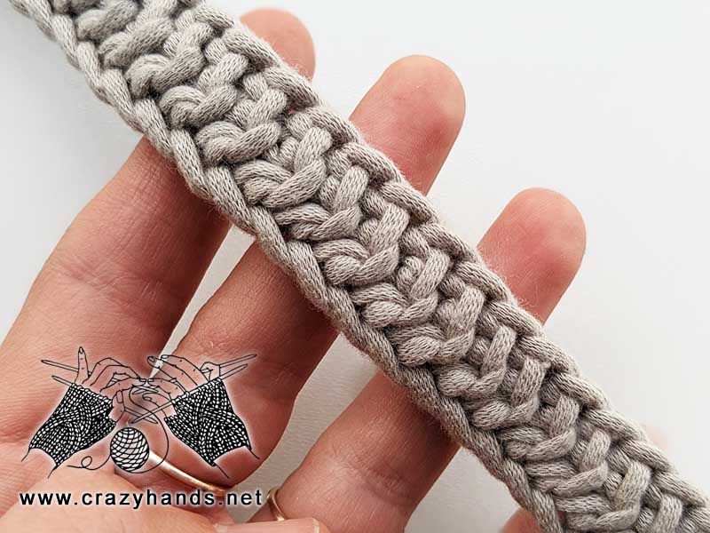 knit belt strap made with gray yarn