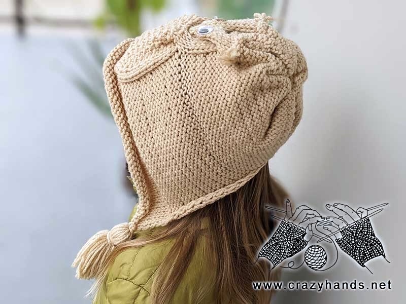 knit owl hat on baby girl - side view