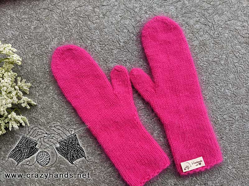 knit Barbie-style pink mittens