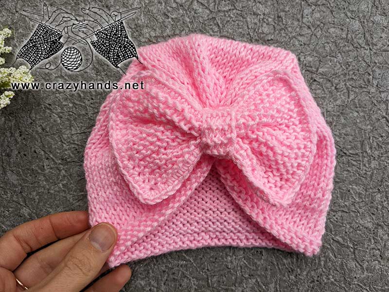 knitting pattern of baby turban hat with bow