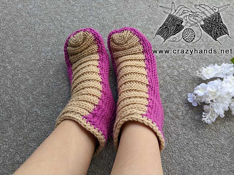 a pair of flat knit two-color slipper socks