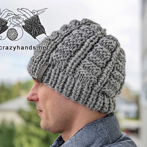 chunky knit slouchy hat on a male model - left-side view
