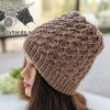 swivel knit winter hat on the mannequin head - left side view