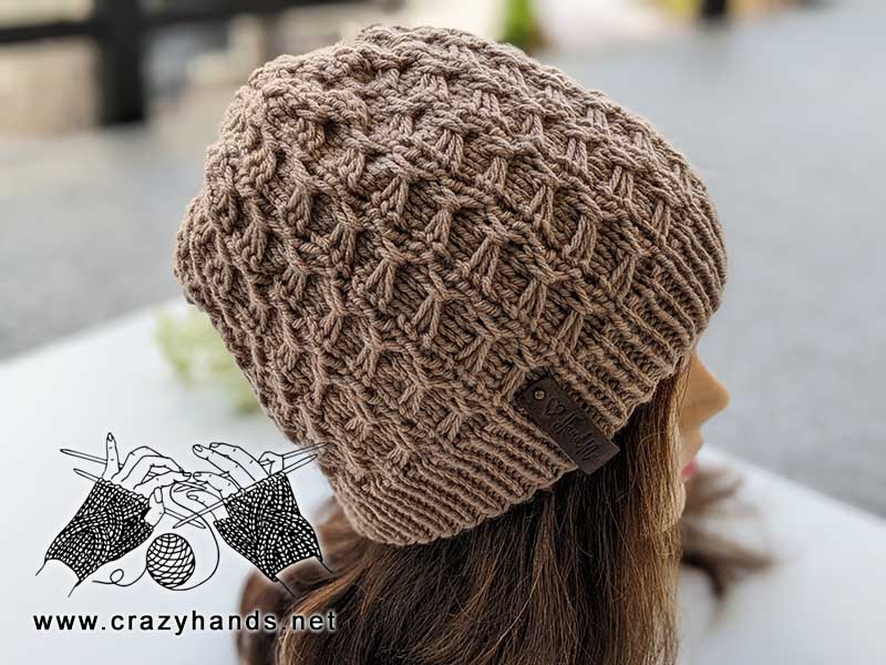 swivel knit winter hat on the mannequin head - right side view