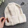 knit wool ease quick & thick hat on a flat surface