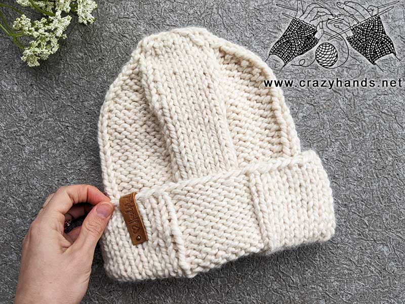 knit wool ease quick & thick hat on a flat surface