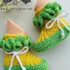 knit baby booties on the mannequin feet