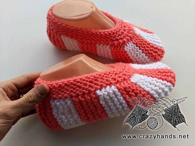 flat knit striped slippers on mannequin feet
