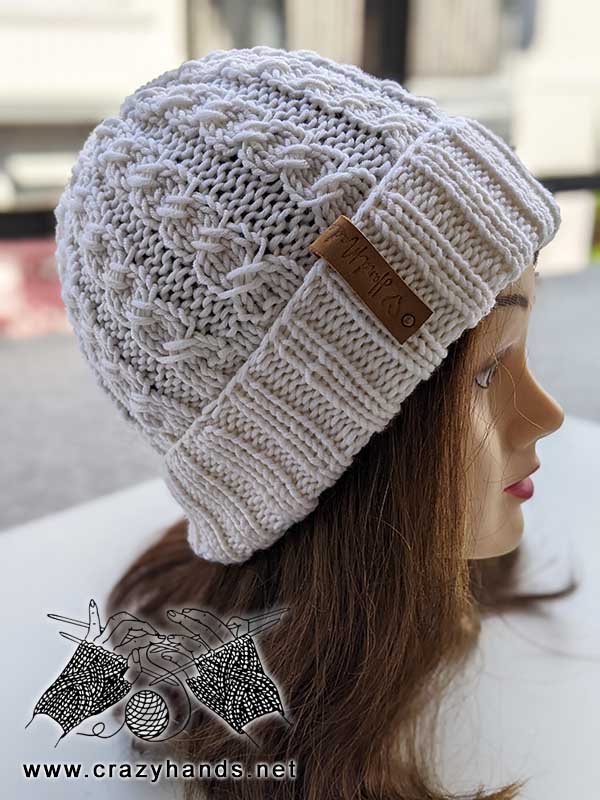 knit lunar cable hat on mannequin's head 