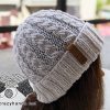 knit lunar cable hat - right side view on a mannequin's head