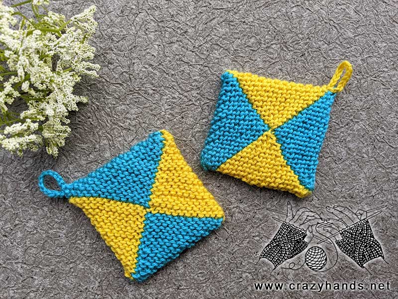 blue and yellow knit square-sized pot holders