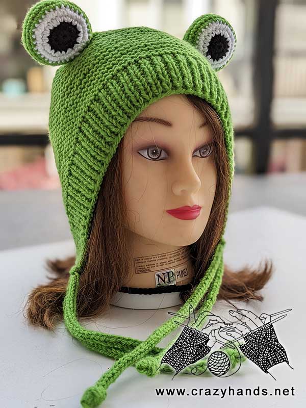 knit frog hat on a female head mannequin - right side view