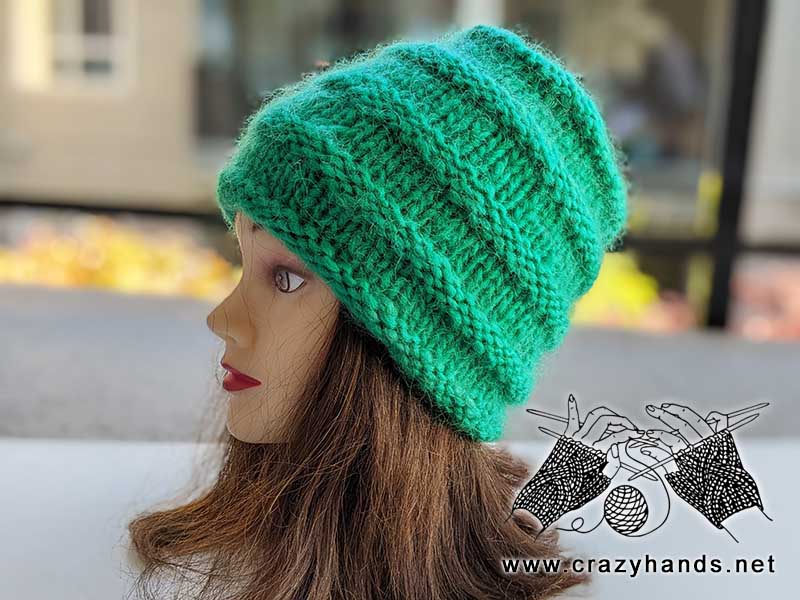 reversible knit chunky hat on mannequin's head - left side view