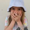 knit summer bucket hat on a toddler girl