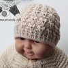 knit newborn baby hat on a doll mannequin - front view