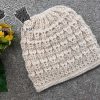 knit newborn baby hat on a flat surface