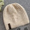 knit two-needles hat on a flat surface