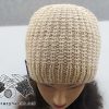 knit two-needles hat on a mannequin's head - front side view