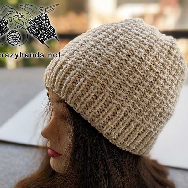 knit two-needles hat on a mannequin's head - left side view