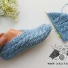 flat knit cable slipper - one finished and another one half-finished