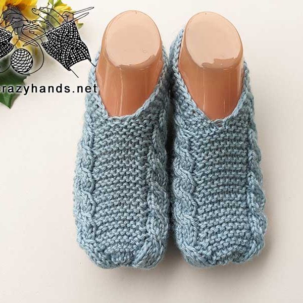 flat knit cable slippers on the mannequin feet