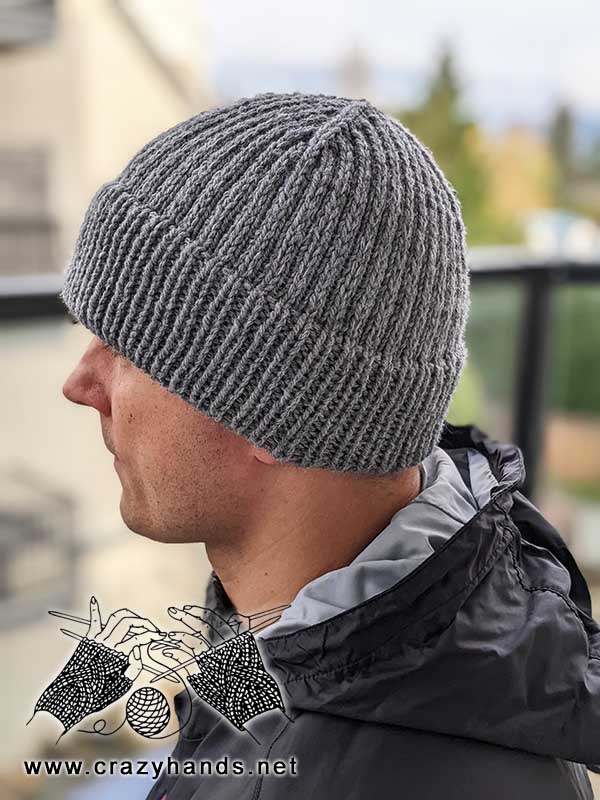 left side view of a men's knit beanie with a fixed double brim