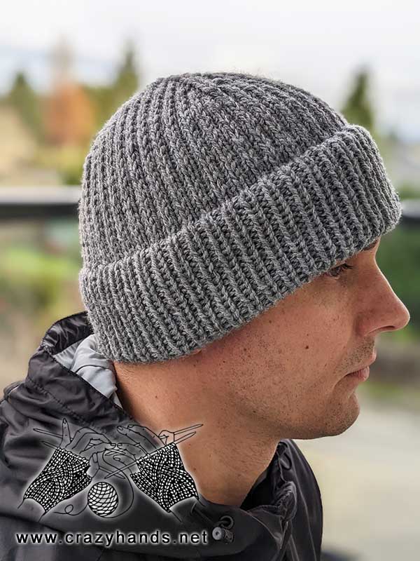 right side view of a men's knit beanie with a fixed double brim