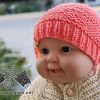 knit newborn beanie on a baby doll