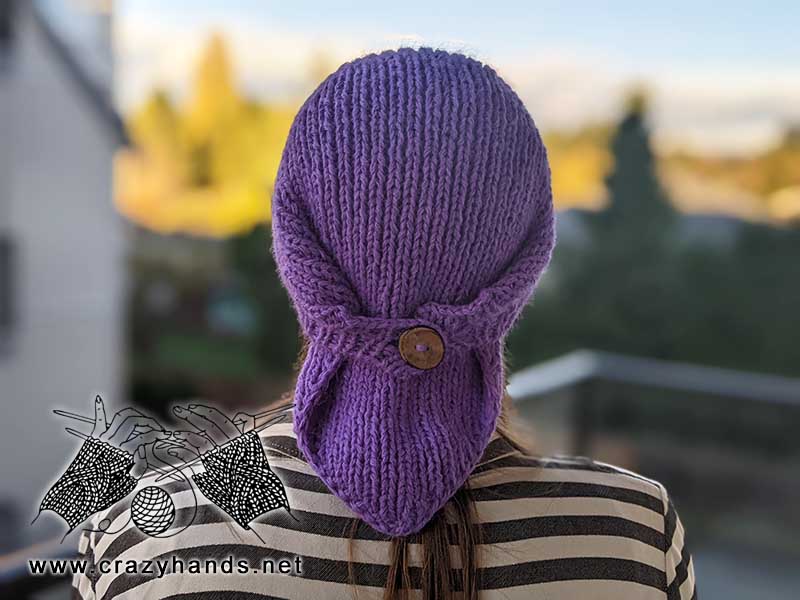 knit winter bandana kerchief on a female model - buttoned backside view