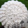 crown view of a flat knit super bulky hat