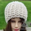 knit flat super bulky hat on a mannequin's head - front view