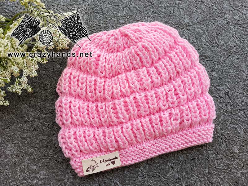 flat knit brioche stitch baby hat on the flat surface