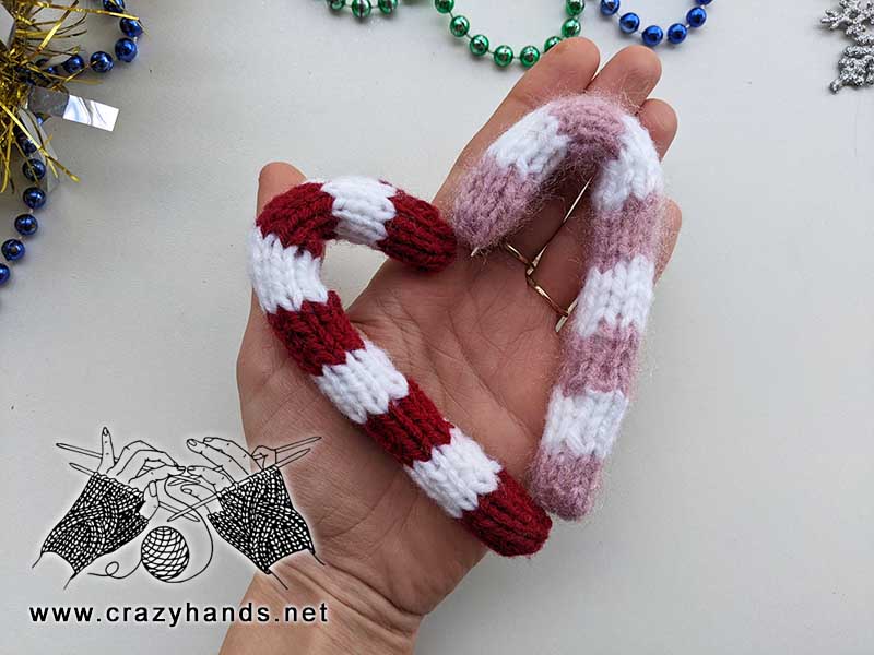 knit candy canes put together in the heart shape