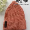 knit ribbed smooth hat - shot on a flat surface