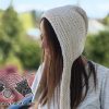 knit super bulky bonnet on female model's head - left side view