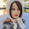 knit super bulky bonnet on the mannequin's head - front side view