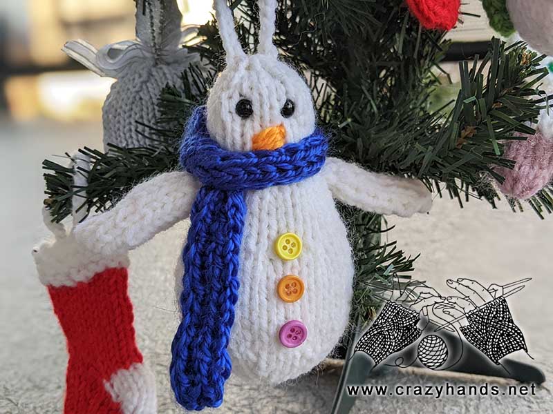 knit snowman on a Christmas tree